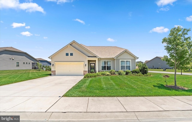 view of front of property featuring a garage and a front lawn