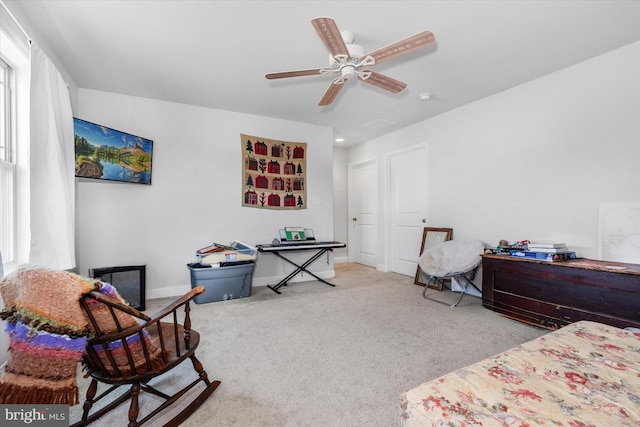 carpeted bedroom featuring ceiling fan