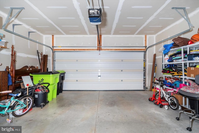 garage featuring a garage door opener