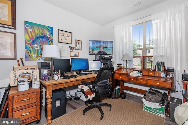 home office featuring hardwood / wood-style flooring