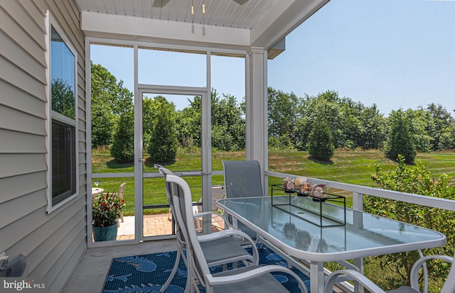 unfurnished sunroom with a wealth of natural light