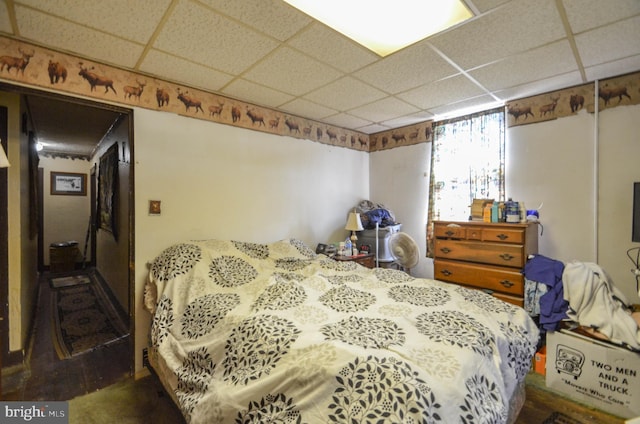 bedroom featuring a paneled ceiling