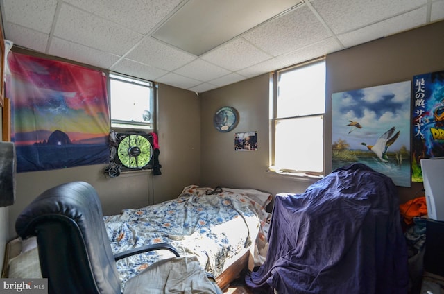 bedroom featuring a paneled ceiling