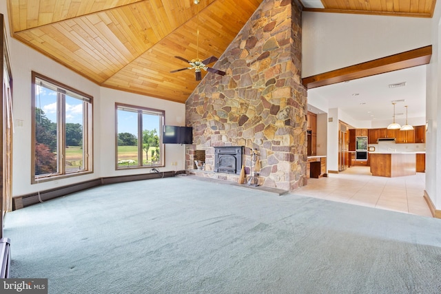 unfurnished living room with light colored carpet, wood ceiling, high vaulted ceiling, and a baseboard heating unit