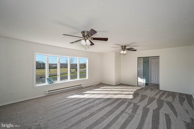 empty room with dark colored carpet, ceiling fan, and a baseboard heating unit