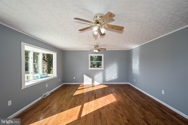 unfurnished room with ceiling fan, wood-type flooring, and ornamental molding