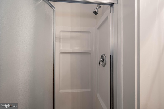 bathroom with an enclosed shower