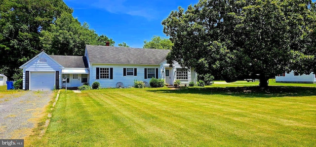 cape cod-style house with a front lawn