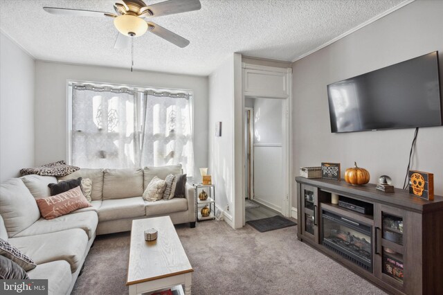 carpeted living room with a textured ceiling and ceiling fan