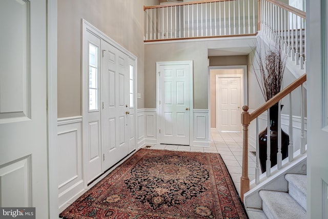 view of tiled foyer entrance