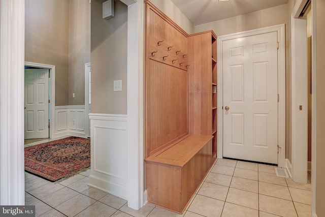 mudroom with light tile patterned floors