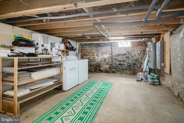 basement with washer and clothes dryer