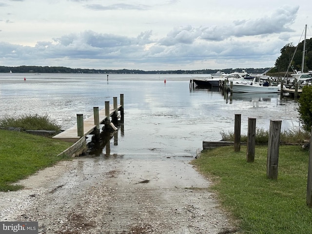 view of dock with a water view