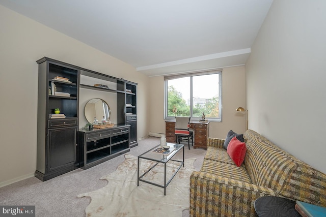 living room featuring baseboard heating and light carpet