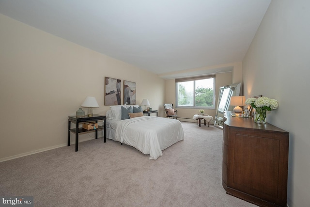 bedroom with light colored carpet