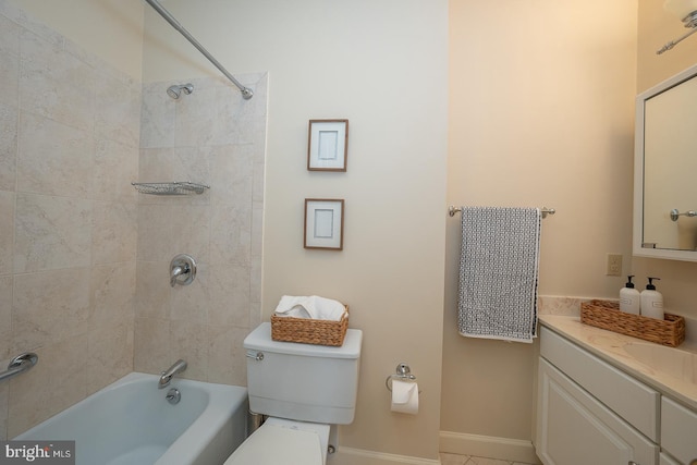 full bathroom with vanity, toilet, and tiled shower / bath