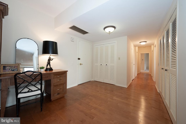 interior space with hardwood / wood-style flooring