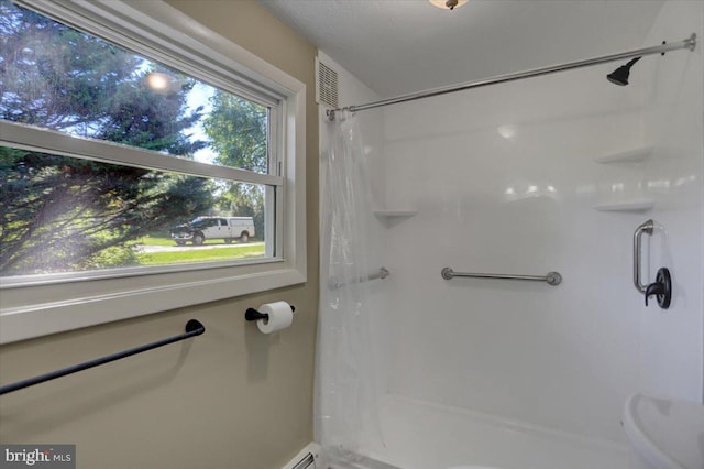 bathroom with walk in shower