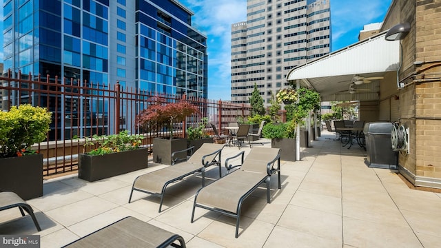 view of patio with ceiling fan