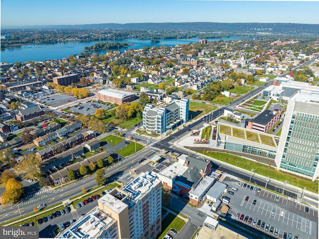 birds eye view of property featuring a water view