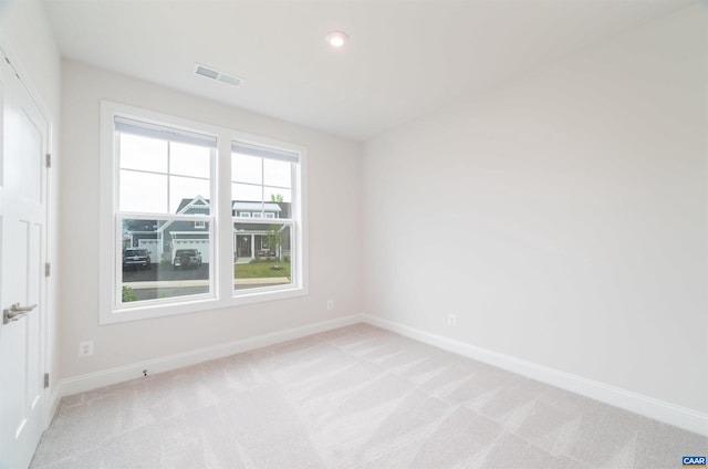 view of carpeted spare room