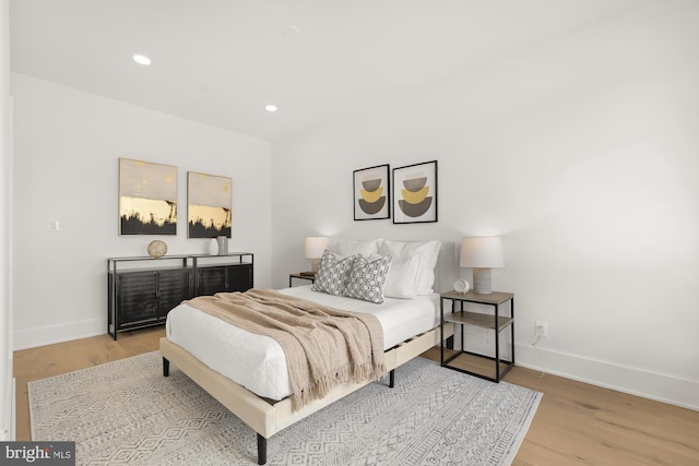 bedroom featuring light wood-type flooring