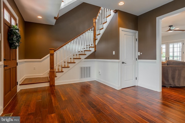 entrance foyer with ceiling fan and hardwood / wood-style flooring