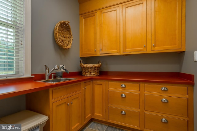 kitchen with sink and tile patterned flooring