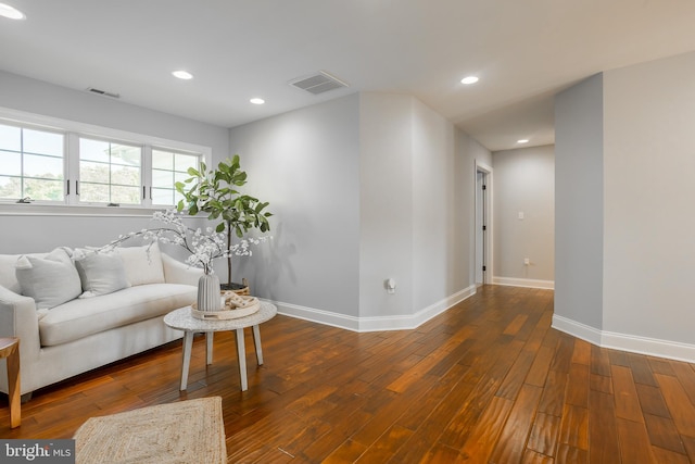 living room featuring dark hardwood / wood-style floors