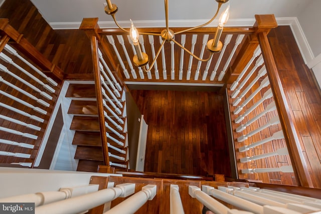 staircase featuring a towering ceiling