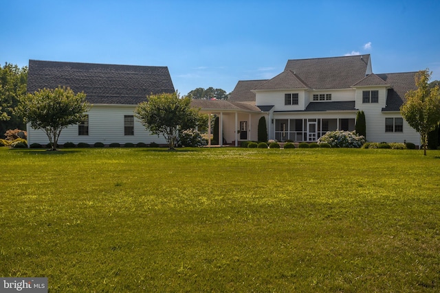 view of front of house with a front lawn