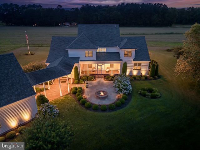 view of front of home with a lawn