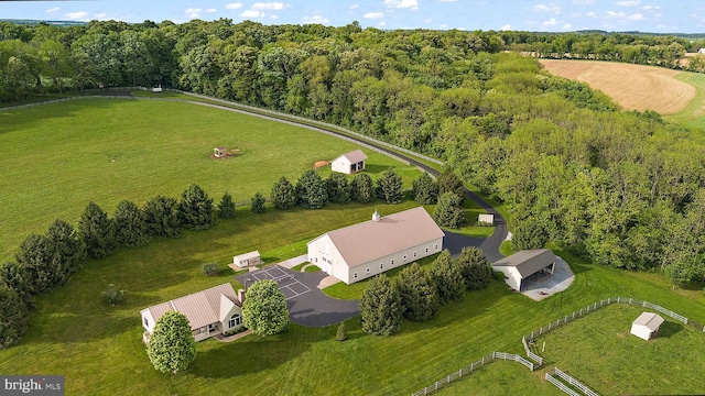 birds eye view of property featuring a rural view