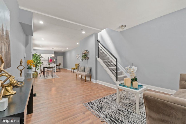 living room with light hardwood / wood-style flooring