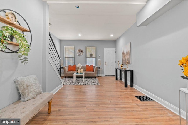 foyer with light hardwood / wood-style floors