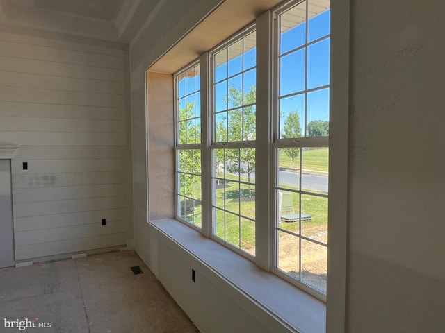 interior space with wood walls and visible vents