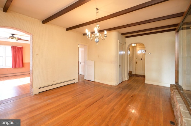 interior space with beamed ceiling, wood-type flooring, ceiling fan with notable chandelier, and a baseboard heating unit