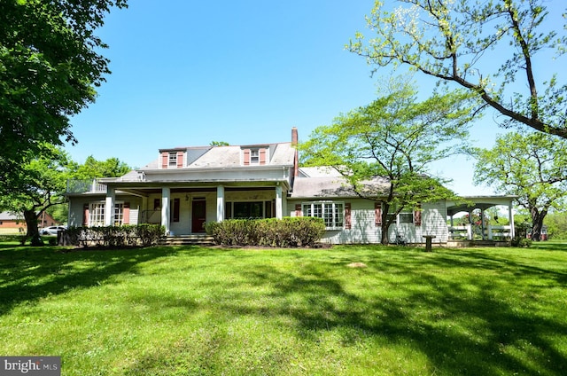 view of front of house featuring a porch and a front yard