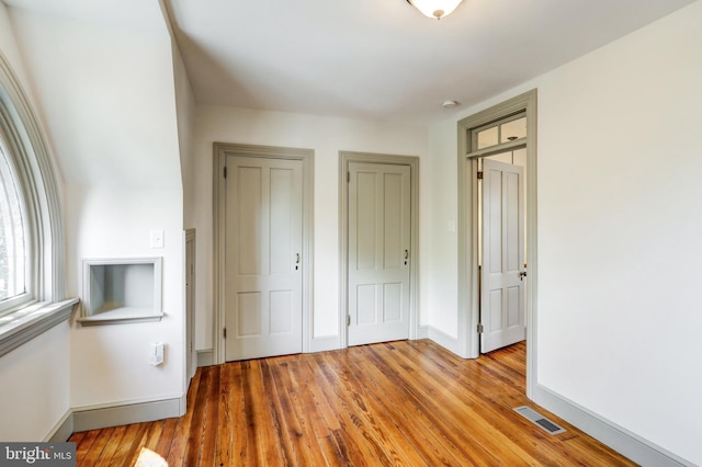 unfurnished bedroom with light hardwood / wood-style floors