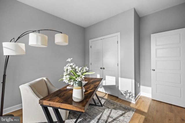 dining room featuring hardwood / wood-style flooring