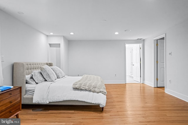 bedroom with light wood-type flooring