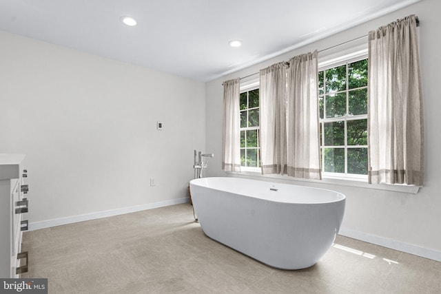 bathroom with tile patterned floors