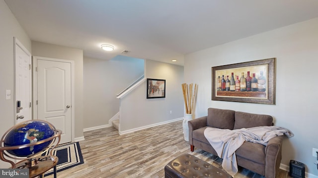 sitting room featuring light wood-type flooring