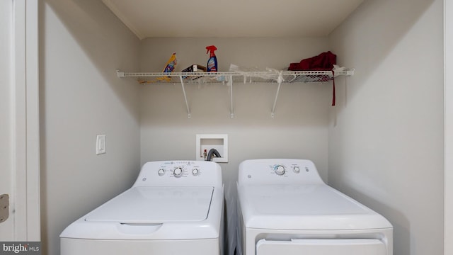 washroom featuring separate washer and dryer