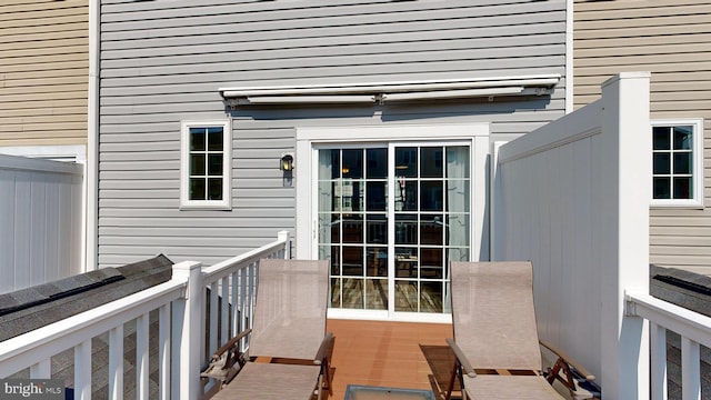 entrance to property featuring a balcony