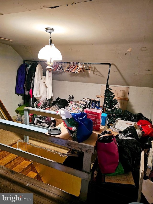 dining space featuring lofted ceiling