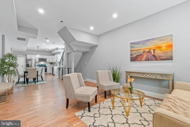 living room featuring light hardwood / wood-style floors