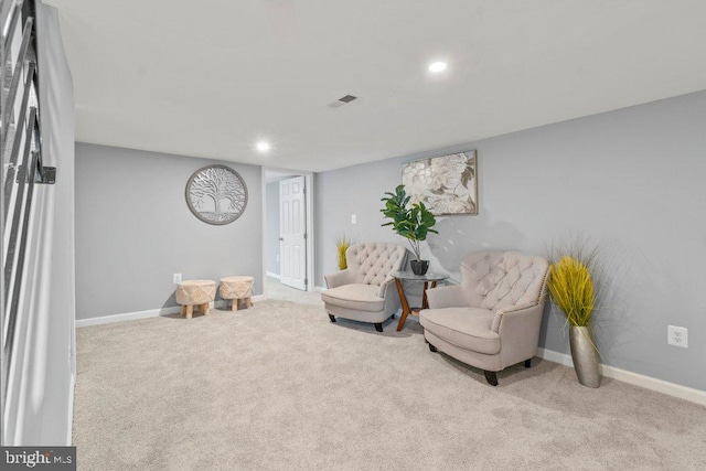 sitting room with light carpet