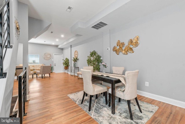 dining room with light hardwood / wood-style flooring