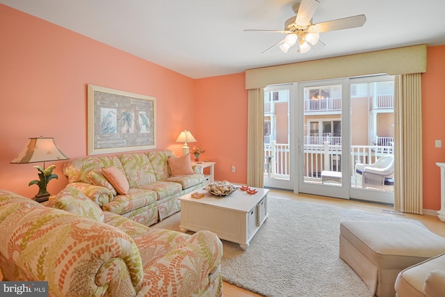 living room featuring ceiling fan